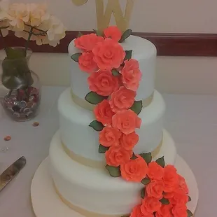 A wedding cake of ours from a beautiful coral and gold wedding