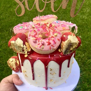 a cake with sprinkles and candy