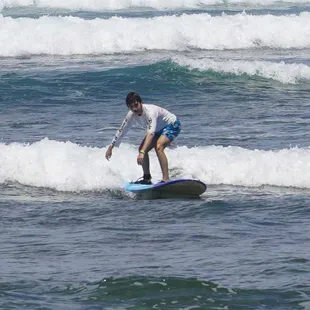 First time surfer having a blast at the age of 15. www.dfcsurf.com for more information.