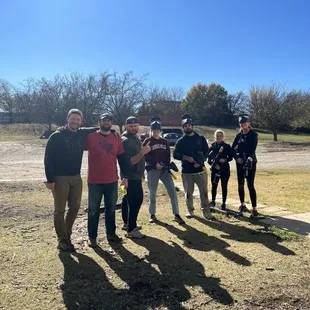 Another group photo close to one of the paintball courses