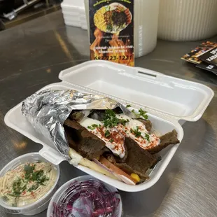 Gyro Sandwich with a sample of hummus