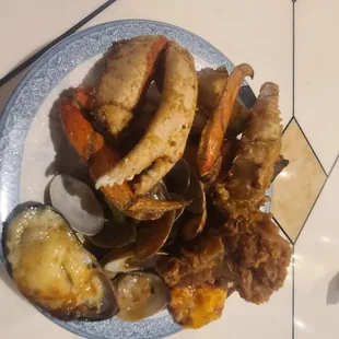 Dry fried dungenous crab, mussel bake, mild clams,