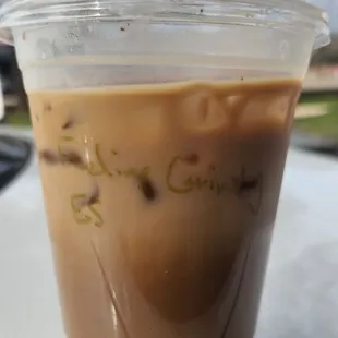16 oz Iced Latte, Feeling Grinchy, which is a Cherry Sumac flavor. Added extra espresso shot. Whole milk.