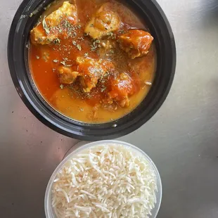 a bowl of rice and a bowl of stew