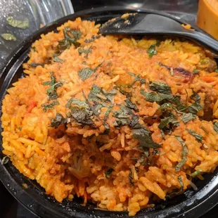 Worst biriyani ever. Basically mixed the curry into rice and called it biriyani. GTFO.