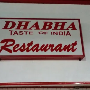 Front of restaurant sign.