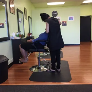 The brow queen working on another satisfied client!