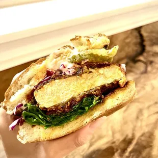 Vegan Spicy Big Cluckers- Nashville: Fried Nashville Chick&apos;n, Creamy Coleslaw, Lemon Mayo, Garlic Pickles, Lettuce