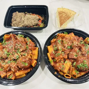 Sunday gravy with rigatoni, meatballs, sausage and pork. Ricotta cheese pie and side of homemade Italian sausage.