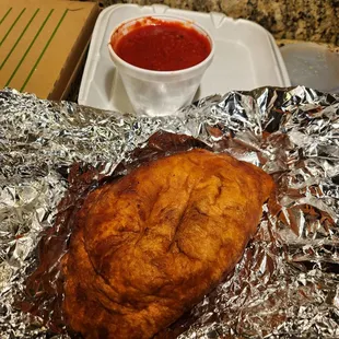 a fish wrapped in tin foil