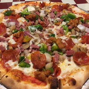 Small combo! Wasn't a fan. Canned mushrooms? Ate two slices and gave the rest to a homeless guy.