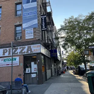 a man walking down the sidewalk
