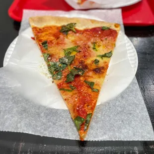 Regular plain slice, $5 + tax + tip