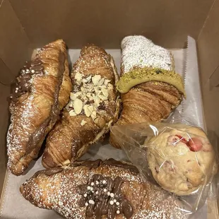 Nutella croissant, almond croissant, pistachio croissant, and M&amp;M cookie