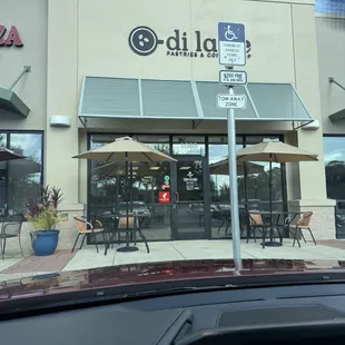 Business storefront, outside seating