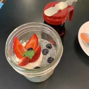 Chia pudding/Greek yogurt with strawberries, blueberries and maple syrup