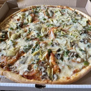 Large Super Veggie Pizza. The crust was soggy and doughy