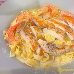 Chicken Fettuccine Alfredo added shrimp  to it . ...