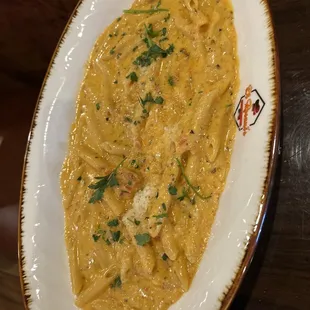 Penne in cream sauce.  I recommend this one if you're in for a good pasta creamy sauce