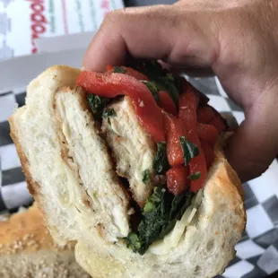 Chicken cutlet with broccoli rabe, roasted pepper and sharp provolone.