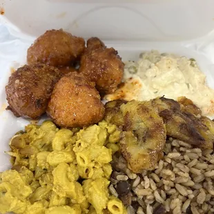 Delicious large plate to go!  Vegan cauliflower bites, Mac &amp; cheese , rice &amp; peas and vegan potato salad