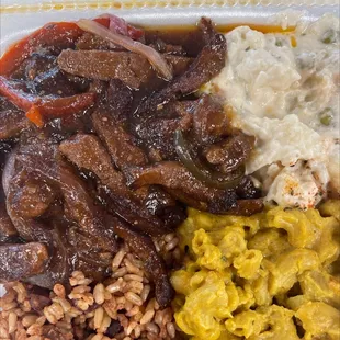 Pepper steak mac n cheese potato salad w/ peas and rice