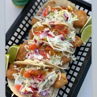 a plate of fish tacos