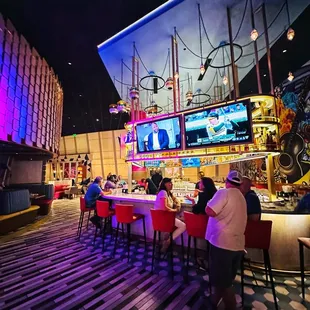 people sitting at the bar