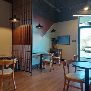 tables and chairs in a coffee shop