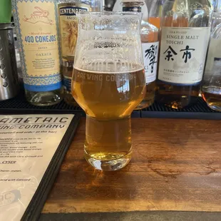 West Coasty V.2 IPA.  7% Total for 2 14oz pours w tip was $16.    Great beer, smooth IPA. Active atmosphere, kind staff.