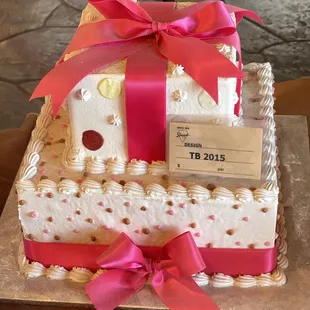 a birthday cake with a price tag