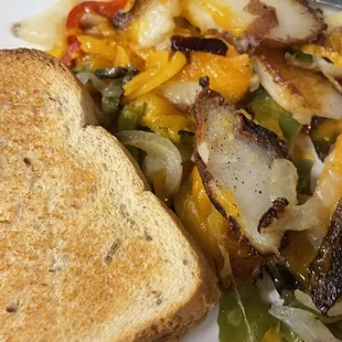Home fries with peppers, onions, and cheese