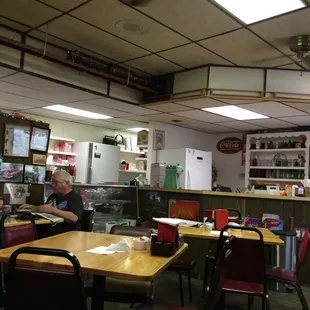 Noisy, fun train runs around the ceiling.