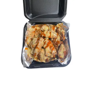 buffalo wings, buffalo sauce mixed with garlic parmesan