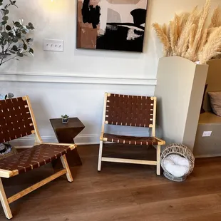 Two lounge chairs- the other tables were filled with customers