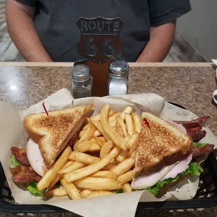 Turkey club with French fries