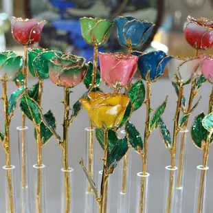 Come see our gorgeous real roses that are trimmed in 24k gold!