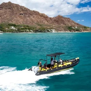 Jump aboard our iconic black &amp; yellow 28&apos; raft