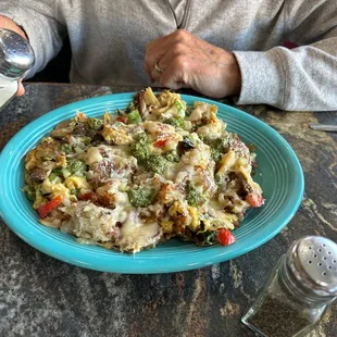 Hash brown scramble with eggs and veggies.