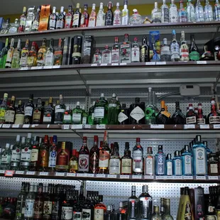 a wide selection of liquor bottles