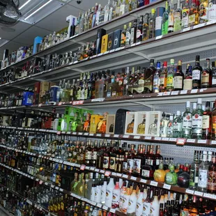 a wide selection of liquor bottles