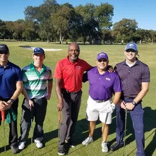 The man in red is Beasley Reece. A defensive back in the NFL for the Dallas Cowboys, New York Giants and Tampa Bay Buccaneers.