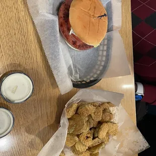 a burger and fried chicken on a table