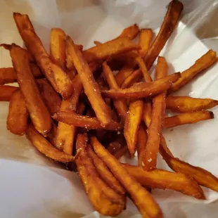 a basket of sweet potato fries