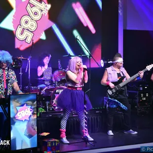 a band performing on stage