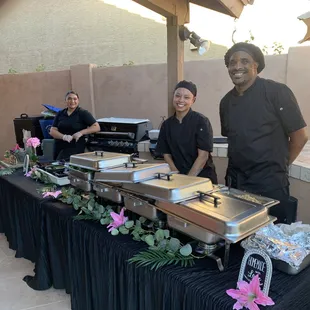 Chicken and beef tacos with condiments, including their homemade hot sauces!