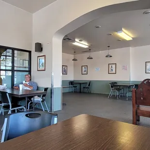 a woman sitting at a table