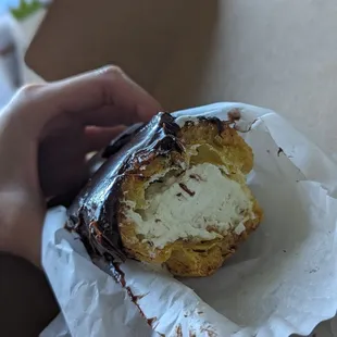 Eclair - not fresh whip cream, weirdly like a marshmallow whip