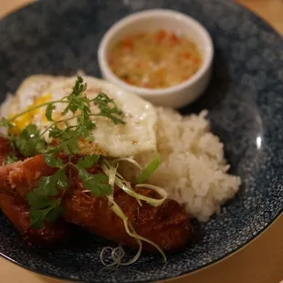 Hmong sausage with egg and sweet and sour sauce.