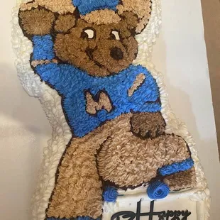 a teddy bear holding a baseball bat